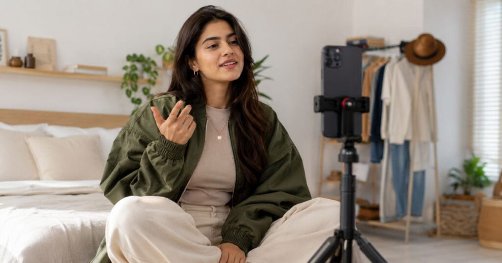 AI fashion prompts for Reels — content creator filming a fashion outfit video